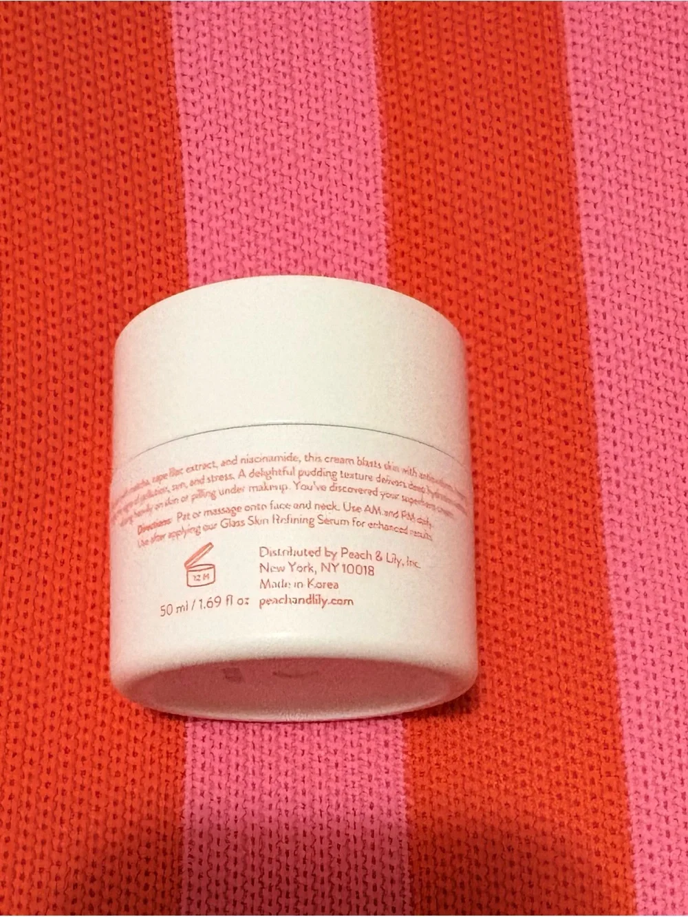 Peach & Lily Matcha Pudding Antioxidant Cream - White Jar with Coral Text